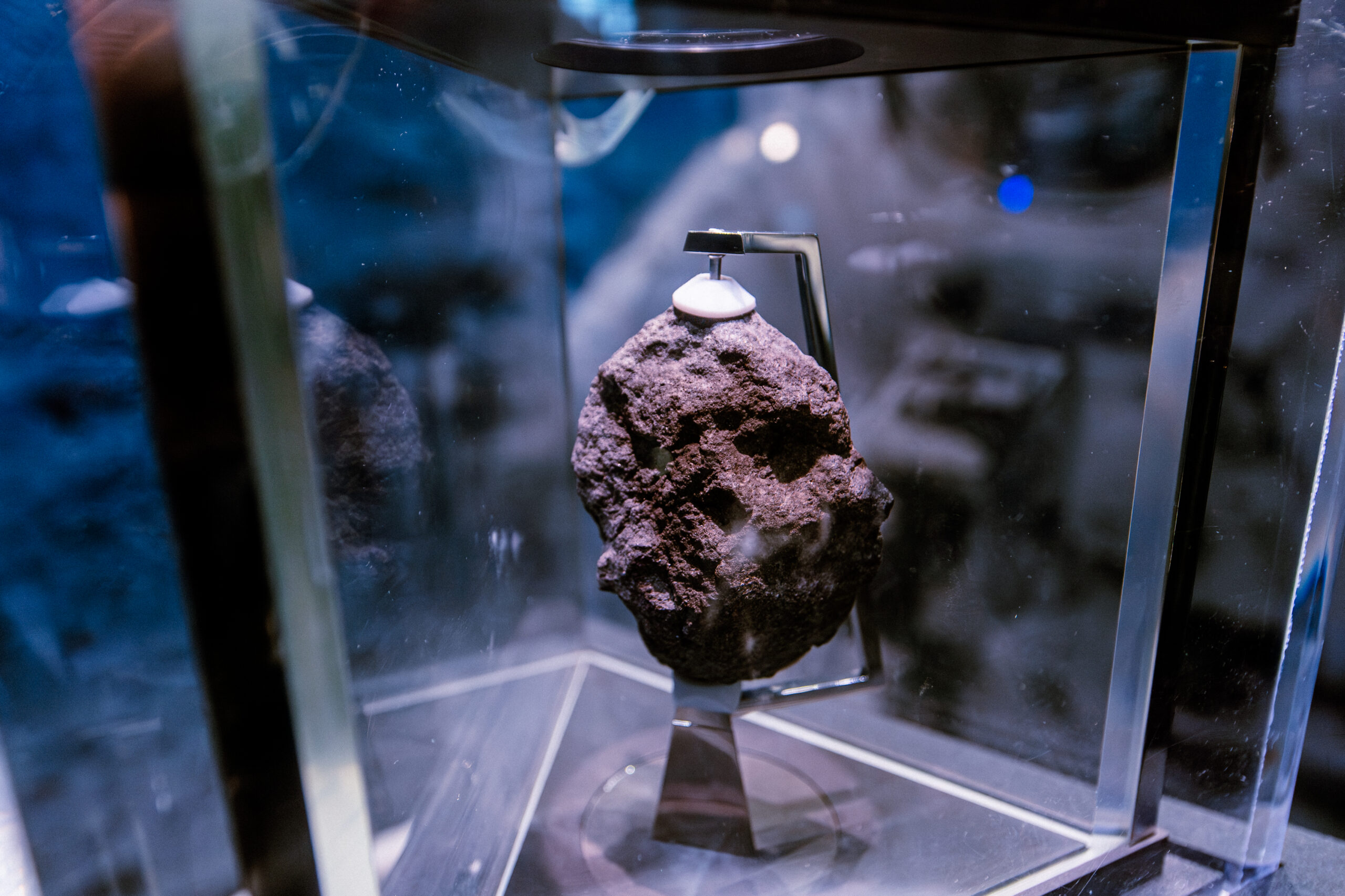 Moon rock sample in a glass display case