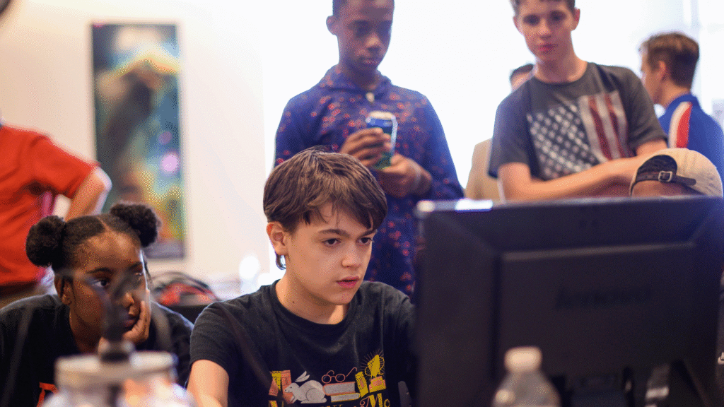 a group of campers working together during their Cyber camp