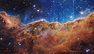 Captured in infrared light by the Near-Infrared Camera (NIRCam) on the NASA/ESA/CSA James Webb Space Telescope, this image reveals previously obscured areas of star birth.