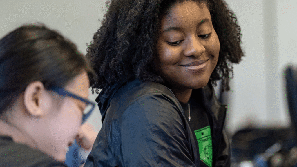two U.S. Cyber campers working together during their assignment