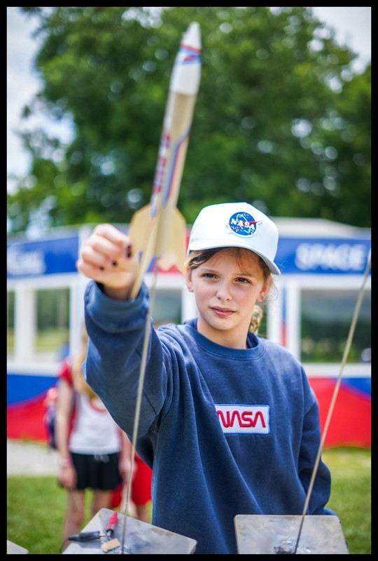 individual having fun building and launching their rocket.