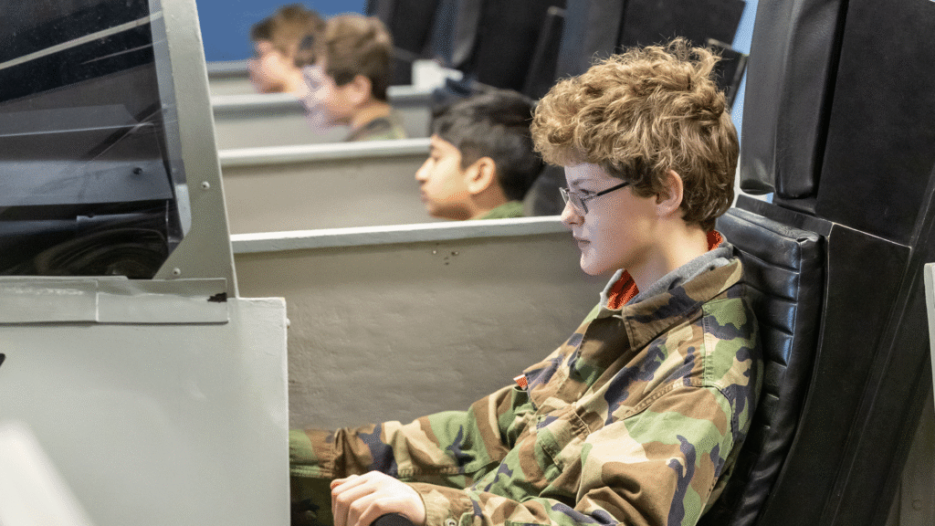 Mach II trainee flying a flight simulator