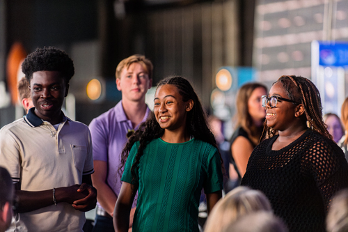 Students smiling during a museum program